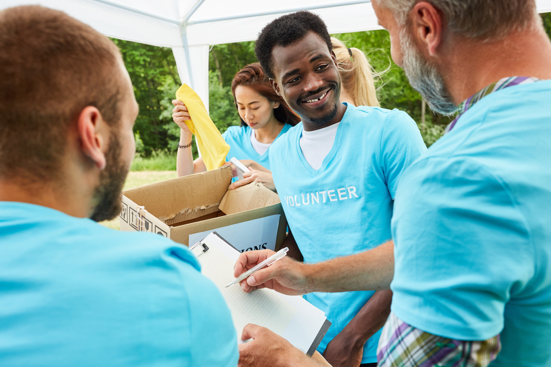 Team Volunteer Collects and Registers Donations